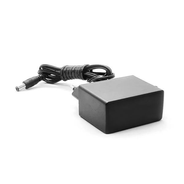 Блок живлення для ТВ приставки 12V 1A (5.5 мм) 680 фото